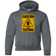 Sweatshirts Dark Heather / YS Caution I'm Texting Youth Hoodie